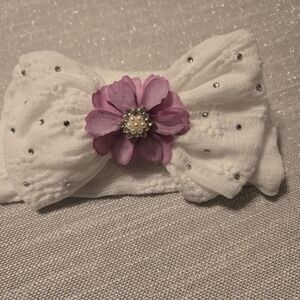 White Headband with Purple Flower Accent